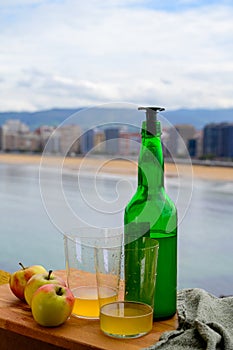 Traditional natural Asturian cider made fromÂ fermented apples in wooden barrels should be poured from great height for air